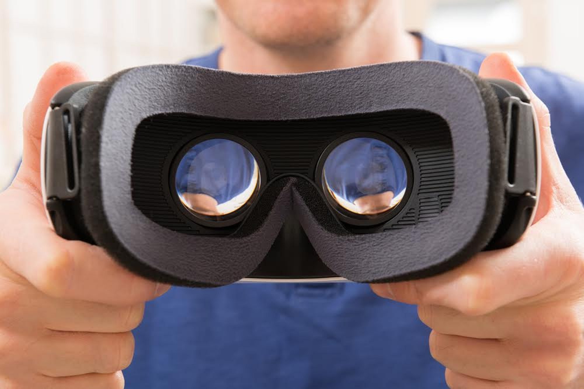 Man holding VR headset