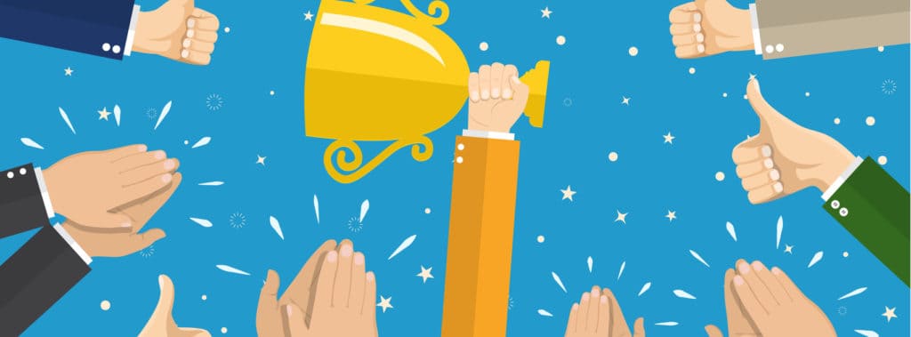 Business people with trophy