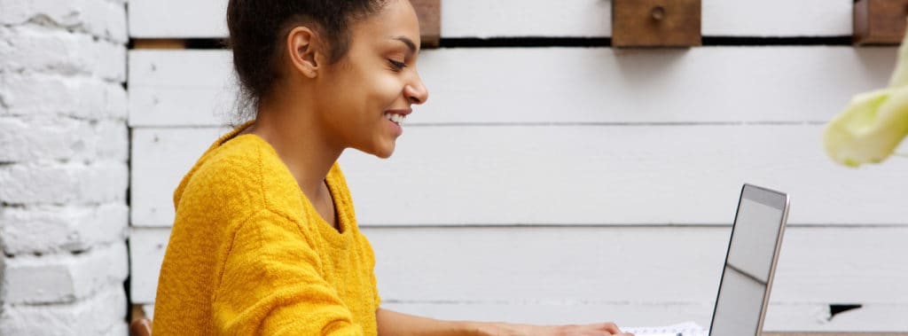 Woman typing on computer